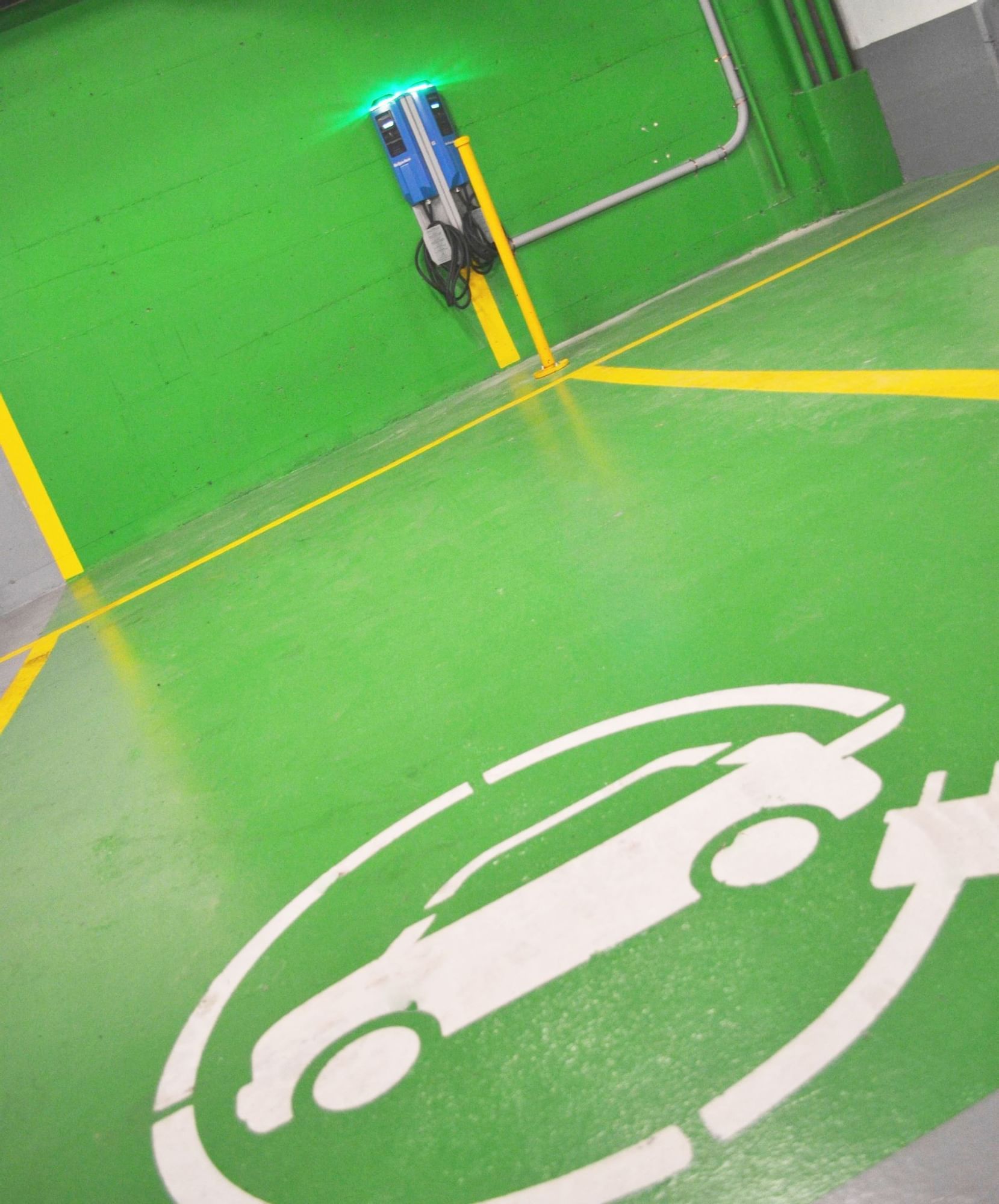 Electric vehicle charging stations in the underground parking garage