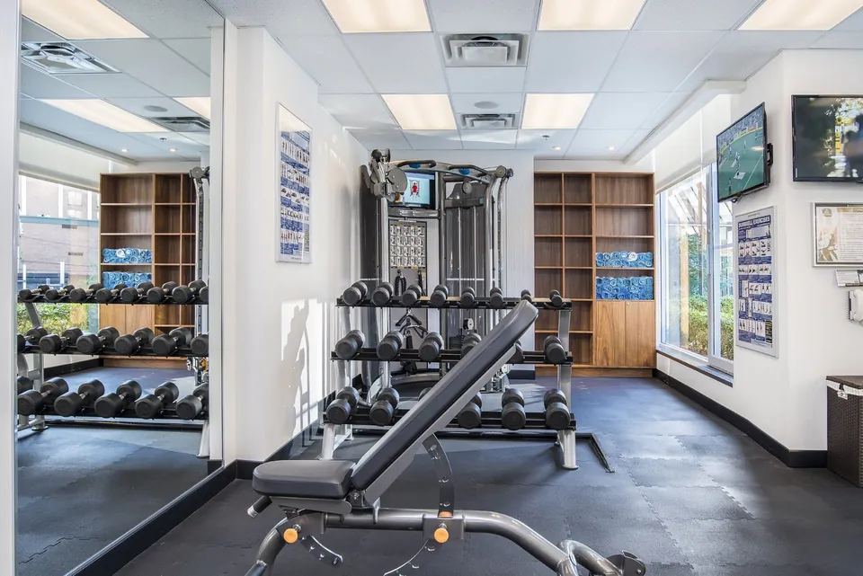 Weight sets and bench in hotel gym