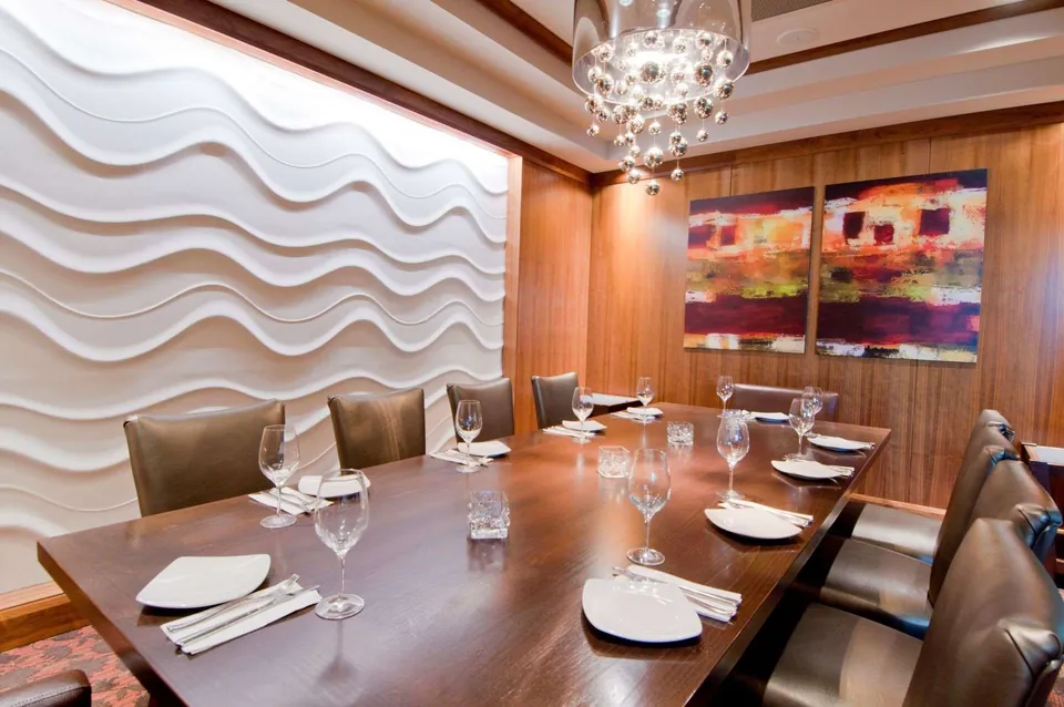 Cambie Room at Chateau Granville set for a private dinner beneath the bubble chandelier