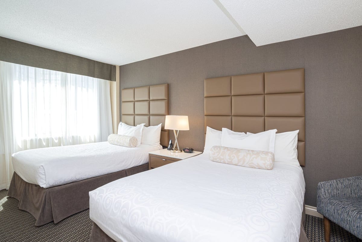 One Bedroom Suite with two double beds and living area